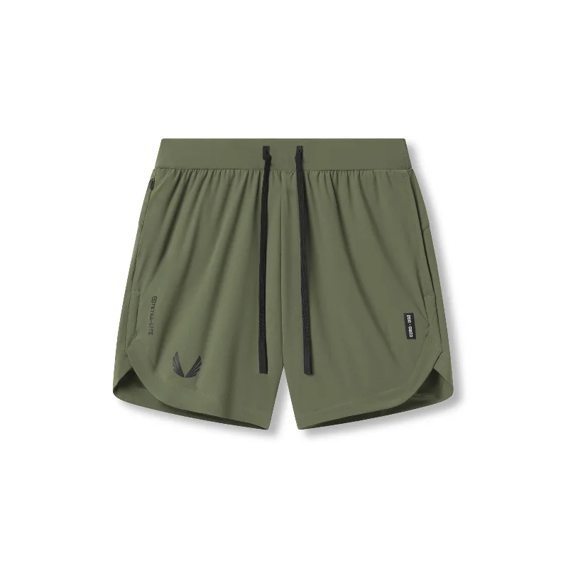 Men's Pants with Faux Leather Patches0823. Tetra-Lite™ 7" Linerless Short - Olive "Wings"