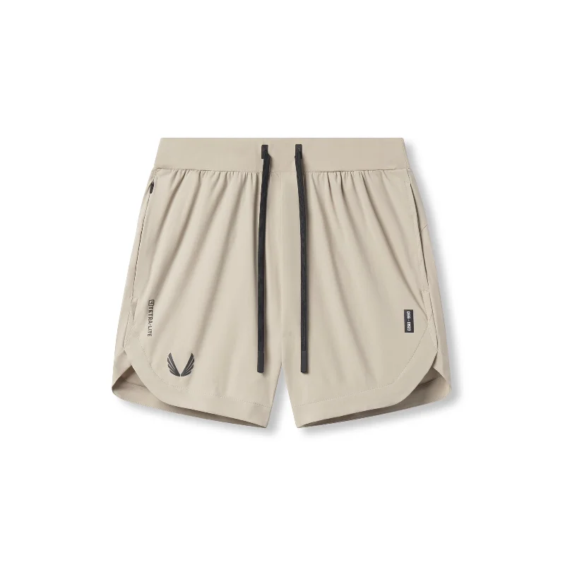 Men's Pants with Pleated Fronts0823. Tetra-Lite™ 7" Linerless Short - Sand Smoke "Wings"