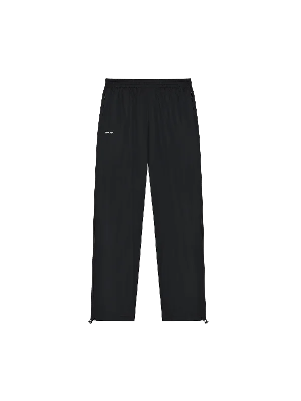 Layered Men's OverallsMens DNA Recycled Nylon Track Pants—black